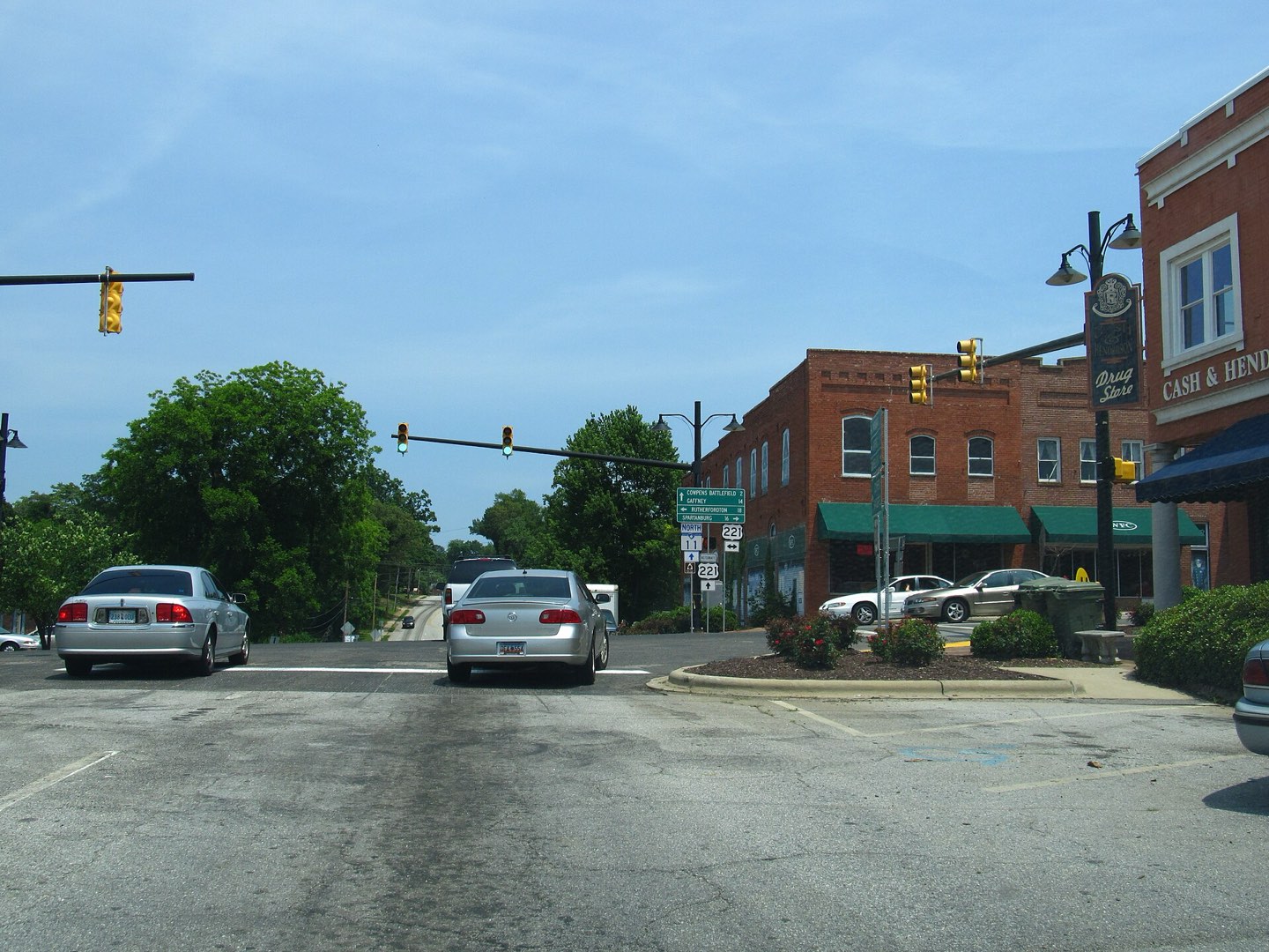 The downtown Chesnee crossroads at Highways 11 and 221, two-story brick buildings with green awnings