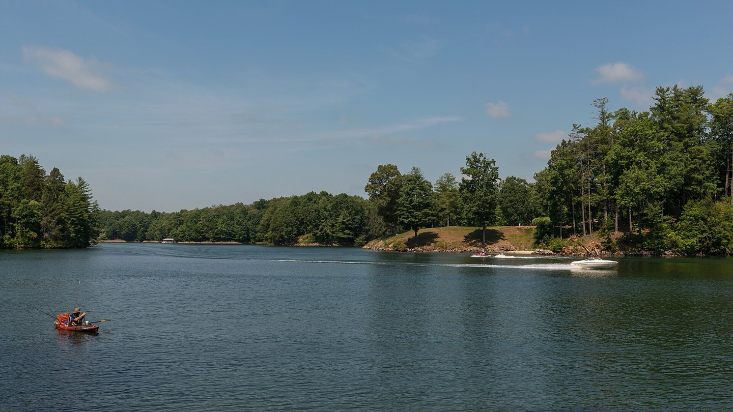 Boats on Lake Keowee seen from Keowee-Toxaway State Park at Sunset